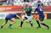 17 August 2014; Jenny Murphy, Ireland, fends off incoming French tackles. 2014 Women's Rugby World Cup 3rd / 4th place Play-off, Ireland v France. Stade Jean Bouin, Paris, France. Picture credit: Aurelien Meunier / SPORTSFILE
