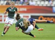 17 August 2014; Jenny Murphy, Ireland, is tackled by Marjorie Mayans, France. 2014 Women's Rugby World Cup 3rd / 4th place Play-off, Ireland v France. Stade Jean Bouin, Paris, France. Picture credit: Aurelien Meunier / SPORTSFILE