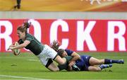 17 August 2014; Grace Davitt, Ireland, on her way to scoring her side's second try of the game, despite the tackle of Jessy Tremouliere, France. 2014 Women's Rugby World Cup 3rd / 4th place Play-off, Ireland v France. Stade Jean Bouin, Paris, France. Picture credit: Aurelien Meunier / SPORTSFILE