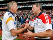 17 August 2014; Tipperary manager Eamon O'Shea, left, shakes hands with Cork manager Jimmy Barry Murphy. GAA Hurling All-Ireland Senior Championship Semi-Final, Cork v Tipperary. Croke Park, Dublin. Picture credit: Barry Cregg / SPORTSFILE