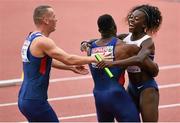 17 August 2014; Great Britain's Desiree Henry, right, celebrates with fellow athletes Great Britain's Harry Aikines-Aryeetey and Richard Kilty, left, after she won the women's 4x100m final. European Athletics Championships 2014 - Day 6. Letzigrund Stadium, Zurich, Switzerland. Picture credit: Stephen McCarthy / SPORTSFILE