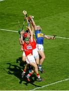 17 August 2014; Pádraic Maher, right, and James Barry, Tipperary, in action against Cork players Séamus Harnedy, Bill Cooper, and Jamie Coughlan. GAA Hurling All-Ireland Senior Championship Semi-Final, Cork v Tipperary. Croke Park, Dublin. Picture credit: Dáire Brennan / SPORTSFILE