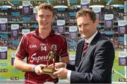 17 August 2014; Jim Dollard from Electric Ireland, proud sponsor of the GAA All-Ireland Minor Championships, presents Ronan Lynch from Limerick with the player of the match award for his outstanding performance in the semi-final. Electric Ireland GAA Hurling All Ireland Minor Championship Semi-Final, Galway v Limerick. Croke Park, Dublin. Photo by Sportsfile