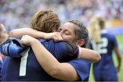17 August 2014; France's Christelle Chobet and Lise Arricaste embrace after the final whistle. 2014 Women's Rugby World Cup 3rd / 4th place Play-off, Ireland v France. Stade Jean Bouin, Paris, France. Picture credit: Aurelien Meunier / SPORTSFILE