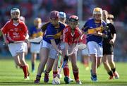 17 August 2014; Katie Hunt, Ardrahan National School, Galway, representing Tipperary, in action against Ava Sweeney, Scoil Mhuire, Roscommon, representing Cork. INTO/RESPECT Exhibition GoGames, Croke Park, Dublin. Picture credit: Brendan Moran / SPORTSFILE