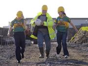 31 October 2006; Radek Podgorski, M & I Construction, gets some lessons from Leitrim Ladies footballers Sinead Quinn, left, and Amanda Sweeney, on the site of the proposed new stand in Pairc Sean MacDiarmada. An innovative fundraising drive, titled &quot;Get On The Team&quot;, was launched today by Leitrim GAA supporters and Board to raise 1.5 million euro to complete the redevelopment of the stadium. Carrick-on-Shannon, Leirtim. Picture credit: Brian Lawless / SPORTSFILE
