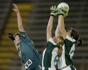 31 October 2006; Michaela Downey, centre, and team-mate Caroline O'Hanlon, Ireland, in action against Janine Milne, Australia. Ladies International Rules Series 2006, First Test, Ireland v Australia, Kingspan Breffni Park, Cavan. Picture credit: Brian Lawless / SPORTSFILE