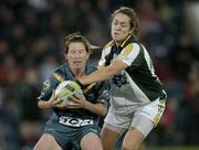 31 October 2006; Angela Doyle, Australia, in action against Caroline O'Hanlon, Ireland. Ladies International Rules Series 2006, First Test, Ireland v Australia, Kingspan Breffni Park, Cavan. Picture credit: Brian Lawless / SPORTSFILE