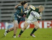 31 October 2006; Cora Staunton, Ireland, in action against Lauren Tesoriero, Australia. Ladies International Rules Series 2006, First Test, Ireland v Australia, Kingspan Breffni Park, Cavan. Picture credit: Brian Lawless / SPORTSFILE