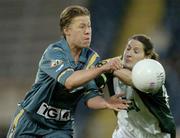 31 October 2006; Meg Hutchins, Australia, in action against Alma O'Donnell, Ireland. Ladies International Rules Series 2006, First Test, Ireland v Australia, Kingspan Breffni Park, Cavan. Picture credit: Brian Lawless / SPORTSFILE