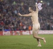 28 October 2006; A streaker  goes on the pitch at half time. Coca-Cola International Rules Series 2006, First Test, Ireland v Australia, Pearse Stadium, Galway. Picture credit: Ray Ryan / SPORTSFILE