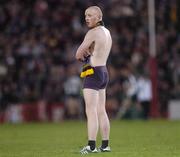 28 October 2006; A Pitch invader stands defiant as he awaits Gardai to escort him of the pitch at Pearse stadium. Coca-Cola International Rules Series 2006, First Test, Ireland v Australia, Pearse Stadium, Galway. Picture credit: Ray Ryan / SPORTSFILE