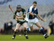 5 November 2006; Jeffrey Bermingham, Ireland, in action against Kenny Ross, Scotland. Senior Men's Hurling Shinty International, Ireland v Scotland, Croke Park, Dublin. Picture credit: Brendan Moran / SPORTSFILE