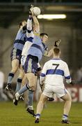 6 November 2006; Mark Ward, front, and James Sherry, UCD, in action against Patrick Gilroy, St. Vincents. Dublin Senior Football Championship Final, UCD v St. Vincents, Parnell Park, Dublin. Picture credit: Pat Murphy / SPORTSFILE
