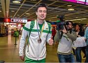 18 August 2014; Team Ireland's 800m bronze medalist Mark English on his return from the European Athletics Championships 2014 in Zurich, Switzerland. Dublin Airport, Dublin. Picture credit: Pat Murphy / SPORTSFILE