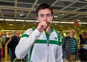 18 August 2014; Team Ireland's 800m bronze medalist Mark English kisses his medal on his return from the European Athletics Championships 2014 in Zurich, Switzerland. Dublin Airport, Dublin. Picture credit: Pat Murphy / SPORTSFILE