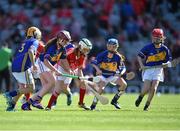 17 August 2014; Niamh O'Dowd, centre, Kilmovee National School, Mayo, representing Cork, in action against players representing Tipperary, from left, Kirsty Morgan O'Reilly, Scoil Mhuire, Monaghan, Katie Hunt, Ardrahan National School, Galway, Emer Twohy, Lisseenhall National School, Tipperary, and Meaghan Clarke, Lady of Lourdes Primary School, Tyrone. INTO/RESPECT Exhibition GoGames, Croke Park, Dublin. Picture credit: Brendan Moran / SPORTSFILE