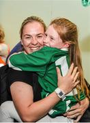 18 August 2014; Ireland's Niamh Briggs, with niece Katie Cashman, aged 7, pictured in Dublin Airport on her return from the Women's Rugby World Cup in France. Dublin Airport, Dublin. Picture credit: Ramsey Cardy / SPORTSFILE