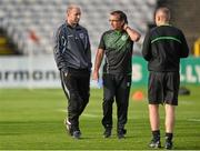 18 August 2014; Bohemians manager Owen Heary, left, and Shamrock Rovers manager Pat Fenlon after the game was deemed unplayable by referee Tom Connolly, right. SSE Airtricity League Premier Division, Bohemians v Shamrock Rovers, Dalymount Park, Dublin. Picture credit: David Maher / SPORTSFILE