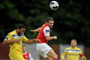 18 August 2014; Christy Fagan, St Patrick's Athletic, in action against Sam Oji, Limerick. SSE Airtricity League Premier Division, St Patrick's Athletic v Limerick, Richmond Park,  Inchicore, Dublin. Picture credit: David Maher / SPORTSFILE