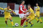 18 August 2014; Keith Fahey, St Patrick's Athletic, in action against Shane Duggan, left, and Jason Hughes, Limerick. SSE Airtricity League Premier Division, St Patrick's Athletic v Limerick, Richmond Park,  Inchicore, Dublin. Picture credit: David Maher / SPORTSFILE