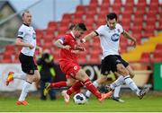 18 August 2014; Sean Maguire, Sligo Rovers, in action against Richie Towell, Dundalk. SSE Airtricity League Premier Division, Sligo Rovers v Dundalk, The Showgrounds, Sligo. Picture credit: Oliver McVeigh / SPORTSFILE