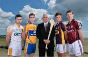 19 August 2014; U-21 stars Tony Kelly, Clare, Stephen McAfee, Antrim, Cathal Mannion, Galway, and Conor McDonald, Wexford, met today in Clanna Gael GAA Club ahead of the Bord Gáis Energy GAA Hurling U-21 All-Ireland Semi Final which take place this Saturday 23rd August in Semple Stadium, Thurles. Clare take on Ulster winners Antrim at 4pm while Galway face Leinster kingpins Wexford at 6pm. Both games will be shown live on TG4 and spectators can vote for their player of the match by using hBGE. Pictured are, from left, Antrim's Stephen McAfee, Clare's Tony Kelly, Wexford's Conor McDonald, Galway's Cathal Mannion with Ger Cunningham, Bord Gáis Energy Sports Ambassador. Bord Gáis Energy GAA Hurling All-Ireland U21 Championship Semi-Final Photocall, Clanna Gael Fontenoy GAA Club, Ringsend, Dublin. Picture credit: Ramsey Cardy / SPORTSFILE