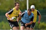 19 August 2014; Munster's Andrew Smith gets away from Alan Cotter during squad training ahead of their pre-season game against Gloucester on Saturday. Munster Rugby Squad Pre-Season Training, Cork Institute of Technology, Cork. Picture credit: Diarmuid Greene / SPORTSFILE