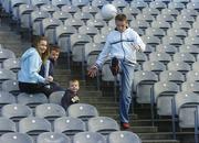 8 November 2006; Science, Sport and Education will come together at the 2006 Kellog's GAA National Coaching Conference, at the launch is Laois footballer Ross Munnelly, with children, left to right, Aoife McConnell, Sean Dardis, and Evan Dardis. Croke Park, Dublin. Picture credit: Pat Murphy / SPORTSFILE