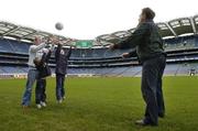8 November 2006; Science, Sport and Education will come together at the 2006 Kellog's GAA National Coaching Conference, at the launch is expert in child physiology Professor Niall Moyna and Laois footballer Ross Munnelly, with children Sean Dardis and Evan Dardis, left. Croke Park, Dublin. Picture credit: Pat Murphy / SPORTSFILE