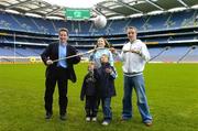 8 November 2006; Science, Sport and Education will come together at the 2006 Kellog's GAA National Coaching Conference, at the launch is Laois footballer Ross Munnelly, right, and expert in child physiology Professor Niall Moyna, with children Aoife McConnell, Sean Dardis, right, and Evan Dardis. Croke Park, Dublin. Picture credit: Pat Murphy / SPORTSFILE