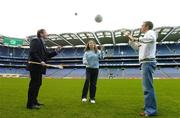 8 November 2006; Science, Sport and Education will come together at the 2006 Kellog's GAA National Coaching Conference, at the launch is Laois footballer Ross Munnelly, right, and expert in child physiology Professor Niall Moyna, with Aoife McConnell. Croke Park, Dublin. Picture credit: Pat Murphy / SPORTSFILE