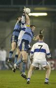 6 November 2006; Mark Ward, front, and James Sherry, UCD, in action against Patrick Gilroy, St. Vincents. Dublin Senior Football Championship Final, UCD v St Vincents, Parnell Park, Dublin. Picture credit: Pat Murphy / SPORTSFILE