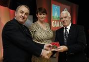 7 November 2006; President of the GAA Nickey Brennan in the company of Carolan Lennon, Director of Marketing, Vodafone, presents Jim Treacy, Kilkenny, a member of the Hurling All Stars of 1971, with a commemorative medal to mark the 35th Anniversary of the Vodafone GAA All-Star Awards scheme at a special celebration in Croke Park, Dublin. Picture credit: Ray McManus / SPORTSFILE