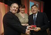 7 November 2006; President of the GAA Nickey Brennan in the company of Carolan Lennon, Director of Marketing, Vodafone, presents Michael 'Babs' Keating, Tipperary, a member of the Hurling All Stars of 1971, with a commemorative medal to mark the 35th Anniversary of the Vodafone GAA All-Star Awards scheme at a special celebration in Croke Park, Dublin. Picture credit: Ray McManus / SPORTSFILE