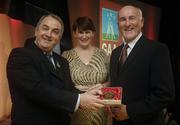 7 November 2006; President of the GAA Nickey Brennan in the company of Carolan Lennon, Director of Marketing, Vodafone, presents Eddie Keher, Kilkenny, a member of the Hurling All Stars of 1971, with a commemorative medal to mark the 35th Anniversary of the Vodafone GAA All-Star Awards scheme at a special celebration in Croke Park, Dublin. Picture credit: Ray McManus / SPORTSFILE