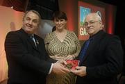 7 November 2006; President of the GAA Nickey Brennan in the company of Carolan Lennon, Director of Marketing, Vodafone, presents Mick Bermingham, Dublin, a member of the Hurling All Stars of 1971, with a commemorative medal to mark the 35th Anniversary of the Vodafone GAA All-Star Awards scheme at a special celebration in Croke Park, Dublin. Picture credit: Ray McManus / SPORTSFILE