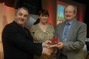 7 November 2006; President of the GAA Nickey Brennan in the company of Carolan Lennon, Director of Marketing, Vodafone, presents Eamon Cregan, Limerick, a member of the Hurling All Stars of 1971, with a commemorative medal to mark the 35th Anniversary of the Vodafone GAA All-Star Awards scheme at a special celebration in Croke Park, Dublin. Picture credit: Ray McManus / SPORTSFILE