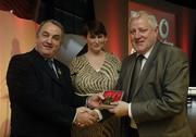 7 November 2006; President of the GAA Nickey Brennan in the company of Carolan Lennon, Director of Marketing, Vodafone, presents PJ Smyth, Galway, a member of the Football All Stars of 1971, with a commemorative medal to mark the 35th Anniversary of the Vodafone GAA All-Star Awards scheme at a special celebration in Croke Park, Dublin. Picture credit: Ray McManus / SPORTSFILE