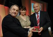 7 November 2006; President of the GAA Nickey Brennan in the company of Carolan Lennon, Director of Marketing, Vodafone, presents Jack Cosgrove, Galway, a member of the Football All Stars of 1971, with a commemorative medal to mark the 35th Anniversary of the Vodafone GAA All-Star Awards scheme at a special celebration in Croke Park, Dublin. Picture credit: Ray McManus / SPORTSFILE