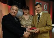 7 November 2006; President of the GAA Nickey Brennan in the company of Carolan Lennon, Director of Marketing, Vodafone, presents Liam Sammon, Galway, a member of the Football All Stars of 1971, with a commemorative medal to mark the 35th Anniversary of the Vodafone GAA All-Star Awards scheme at a special celebration in Croke Park, Dublin. Picture credit: Ray McManus / SPORTSFILE