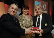 7 November 2006; President of the GAA Nickey Brennan in the company of Carolan Lennon, Director of Marketing, Vodafone, presents Willie Bryan, Offaly, a member of the Football All Stars of 1971, with a commemorative medal to mark the 35th Anniversary of the Vodafone GAA All-Star Awards scheme at a special celebration in Croke Park, Dublin. Picture credit: Ray McManus / SPORTSFILE