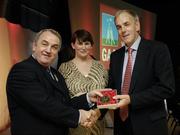 7 November 2006; President of the GAA Nickey Brennan in the company of Carolan Lennon, Director of Marketing, Vodafone, presents Ray Cummins, Cork, a member of the Football All Stars of 1971, with a commemorative medal to mark the 35th Anniversary of the Vodafone GAA All-Star Awards scheme at a special celebration in Croke Park, Dublin. Picture credit: Ray McManus / SPORTSFILE