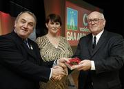 7 November 2006; President of the GAA Nickey Brennan in the company of Carolan Lennon, Director of Marketing, Vodafone, presents Sean O'Neill, Down, a member of the Football All Stars of 1971, with a commemorative medal to mark the 35th Anniversary of the Vodafone GAA All-Star Awards scheme at a special celebration in Croke Park, Dublin. Picture credit: Ray McManus / SPORTSFILE