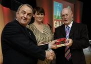 7 November 2006; President of the GAA Nickey Brennan in the company of Carolan Lennon, Director of Marketing, Vodafone, presents Seamus Leydon, Galway, a member of the Football All Stars of 1971, with a commemorative medal to mark the 35th Anniversary of the Vodafone GAA All-Star Awards scheme at a special celebration in Croke Park, Dublin. Picture credit: Ray McManus / SPORTSFILE