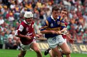 1 September 1996; Aidan Doyle, Tipperary, is tackled by Kevin Coy, Galway. All Ireland Minor Hurling. Picture credit; Ray McManus/SPORTSFILE