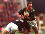 3 October 1999; Brendan Venter of South Africa is tackled by John Leslie of Scotland during the Rugby World Cup Pool A match between Scotland and South Africa at Murrayfield Stadium in Edinburgh, Scotland. Photo by Matt Browne/Sportsfile