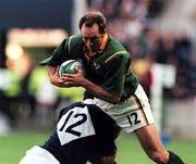 3 October 1999; Brendan Venter of South Africa is tackled by John Leslie of Scotland during the Rugby World Cup Pool A match between Scotland and South Africa at Murrayfield Stadium in Edinburgh, Scotland. Photo by Matt Browne/Sportsfile