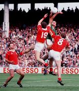 17 September 1989; Liam McHale of Mayo in action against Danny Culloty, left, and Teddy McCarthy of Cork during the All-Ireland Senior Football Championship Final between Cork and Mayo at Croke Park in Dublin. Photo Ray McManus/Sportsfile