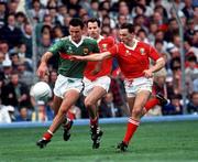 17 September 1989; Liam McHale of Mayo in action against Tony Davis of Cork during the All-Ireland Senior Football Championship Final between Cork and Mayo at Croke Park in Dublin. Photo Ray McManus/Sportsfile